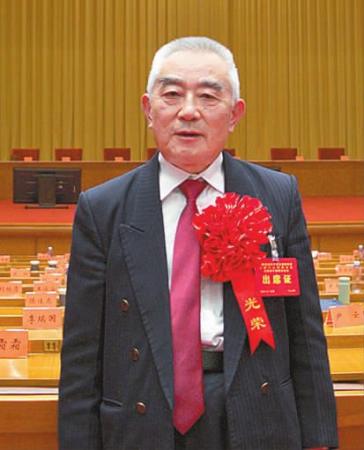 潘明光会长在表彰大会现场。 通讯员 玉夕宣 摄